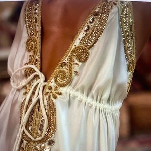 Never worn, still has tags